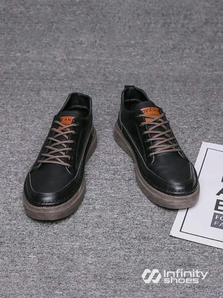 Tênis Casual Couro Sintético Com Solado Alto Estruturado Tênis Casual Couro Sintético Com Solado Alto Estruturado