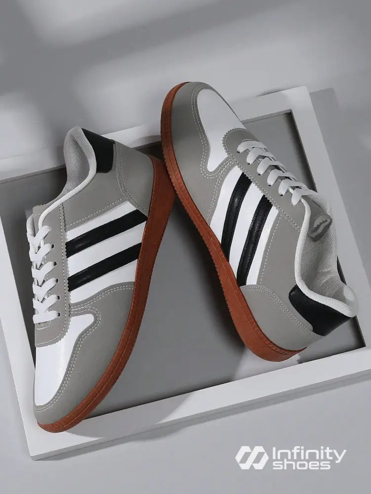 Tênis Casual Retrô Com Detalhes Em Camurça E Solado Emborrachado Tênis Casual Retrô Com Detalhes Em Camurça E Solado