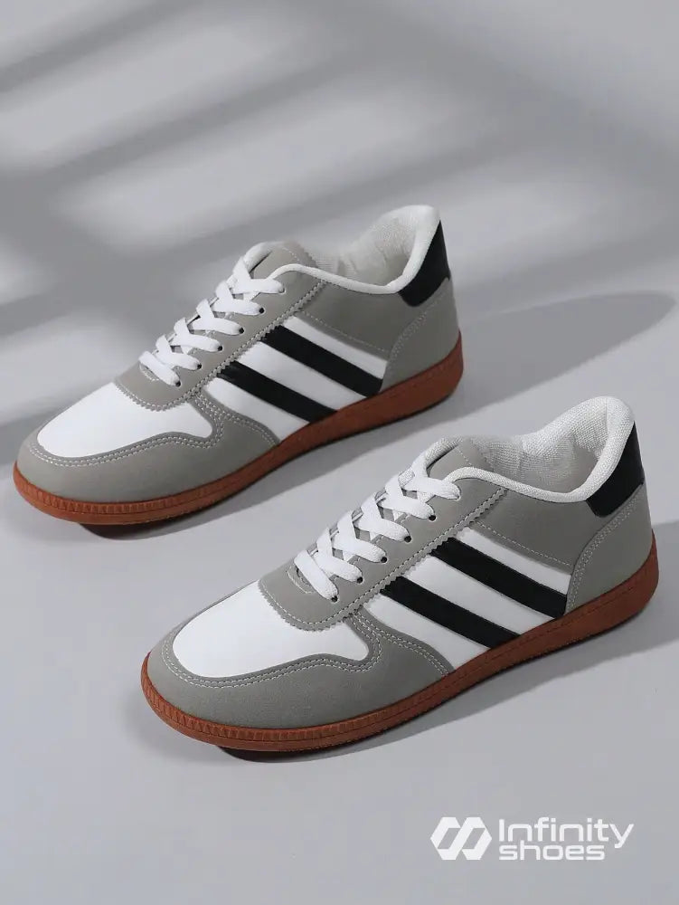 Tênis Casual Retrô Com Detalhes Em Camurça E Solado Emborrachado Tênis Casual Retrô Com Detalhes Em Camurça E Solado