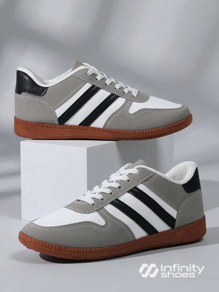 Tênis Casual Retrô Com Detalhes Em Camurça E Solado Emborrachado Tênis Casual Retrô Com Detalhes Em Camurça E Solado